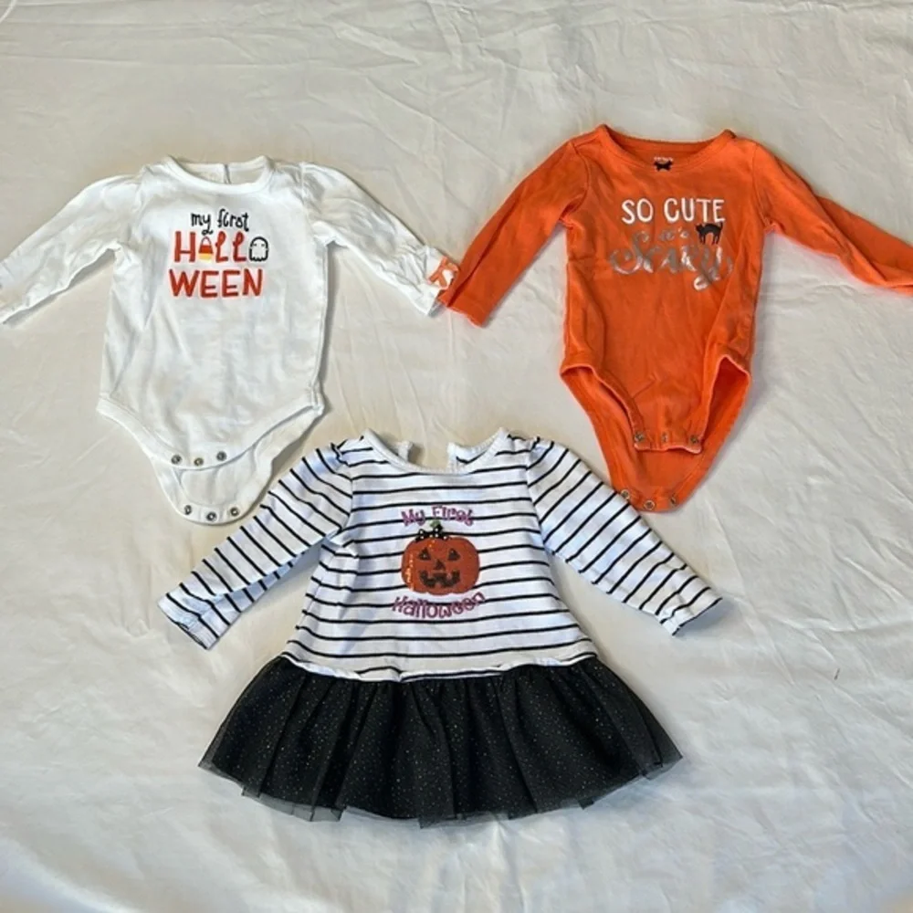 Bundle of my first Halloween clothes. Two long sleeve onesies and a tutu shirt.
